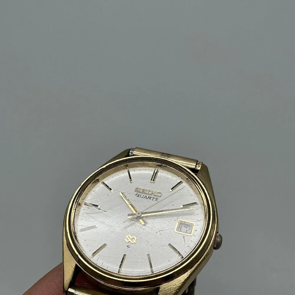 Vintage Seiko Mens Watch 34mm Gold Tone Stretch Band Date 8222-7009 New Battery